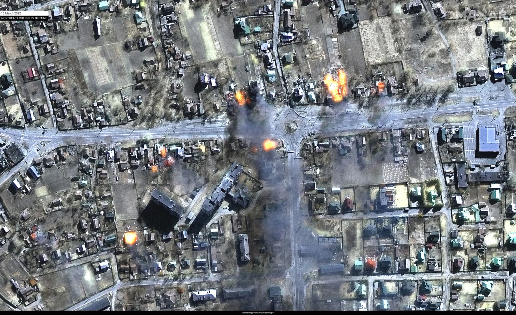 A satellite image shows widespread destruction 