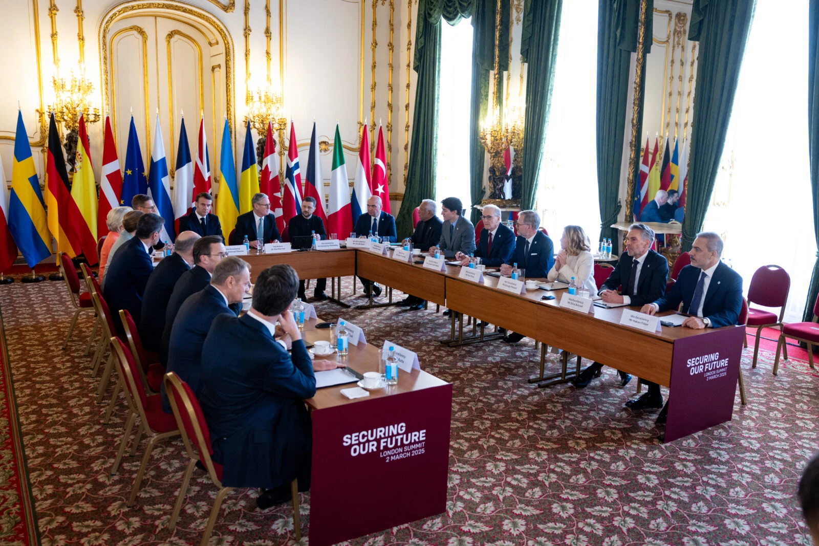 Photo shows British Prime Minister Keir Starmer (C-C), French President Emmanuel Macron (C-L) and Ukrainian President Volodymyr Zelenskyy (C-R).