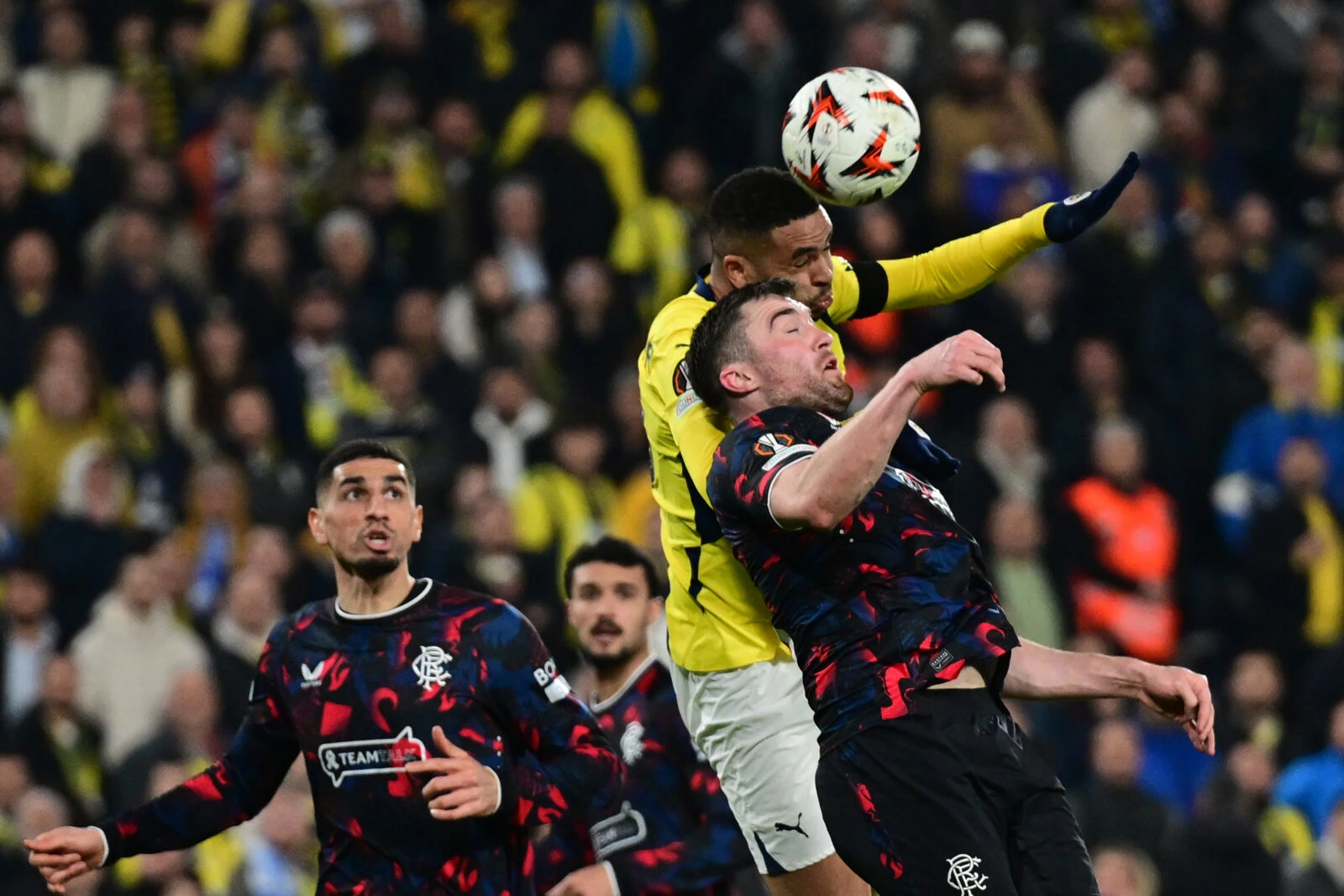 Photo shows Youssef En-Nesyri of Fenerbahce in action against John Souttar of Rangers.