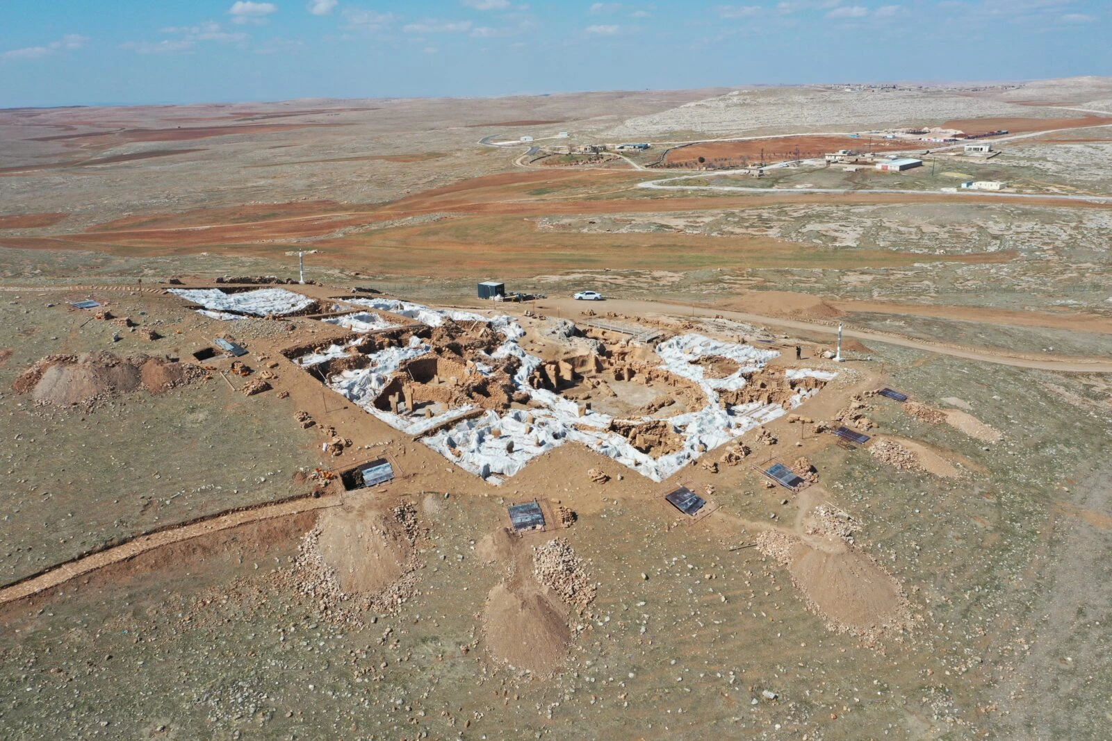 Protective roof construction at Karahantepe Archaeological Site in Sanliurfa for Neolithic-era artifacts.