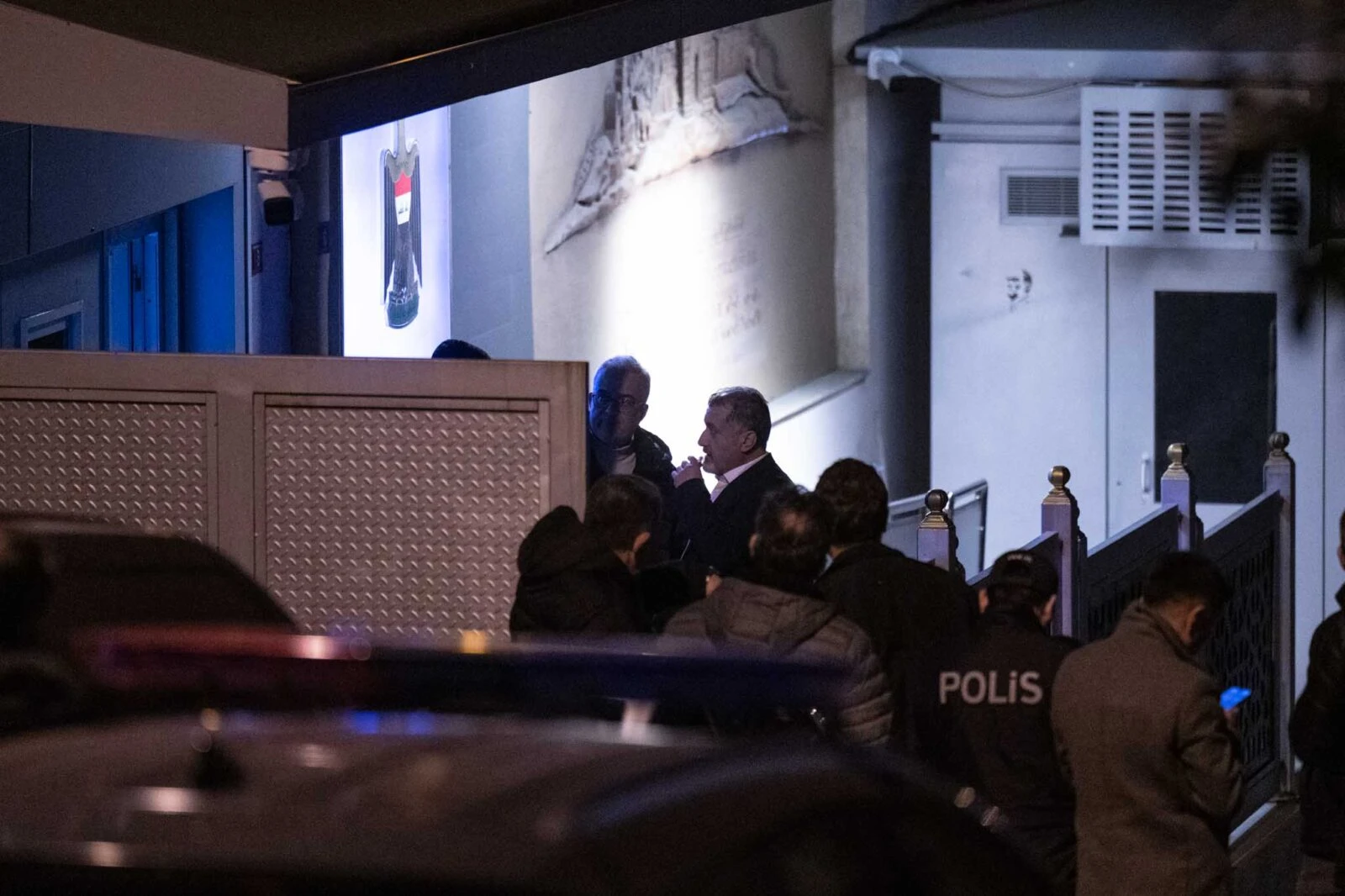 Photo shows Turkish police officers investigating a crime scene.