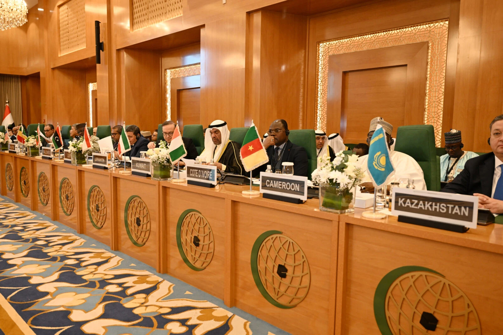 Photo shows diplomats attending an Extraordinary Session of the Council of Foreign Ministers of the Member States of The Organization of Islamic Cooperation