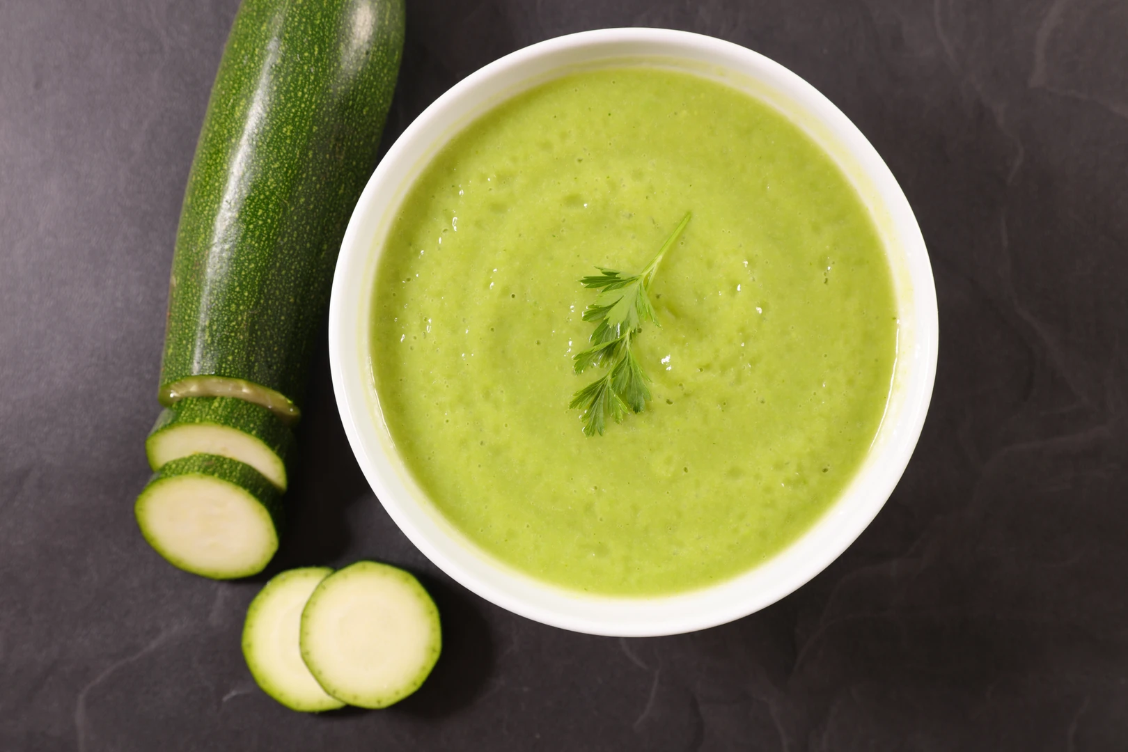 Bowl of creamy zucchini soup.