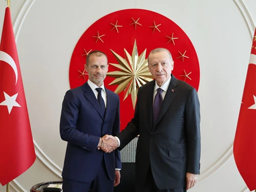 President Recep Tayyip Erdogan (R) meets UEFA President Aleksander Ceferin (L
