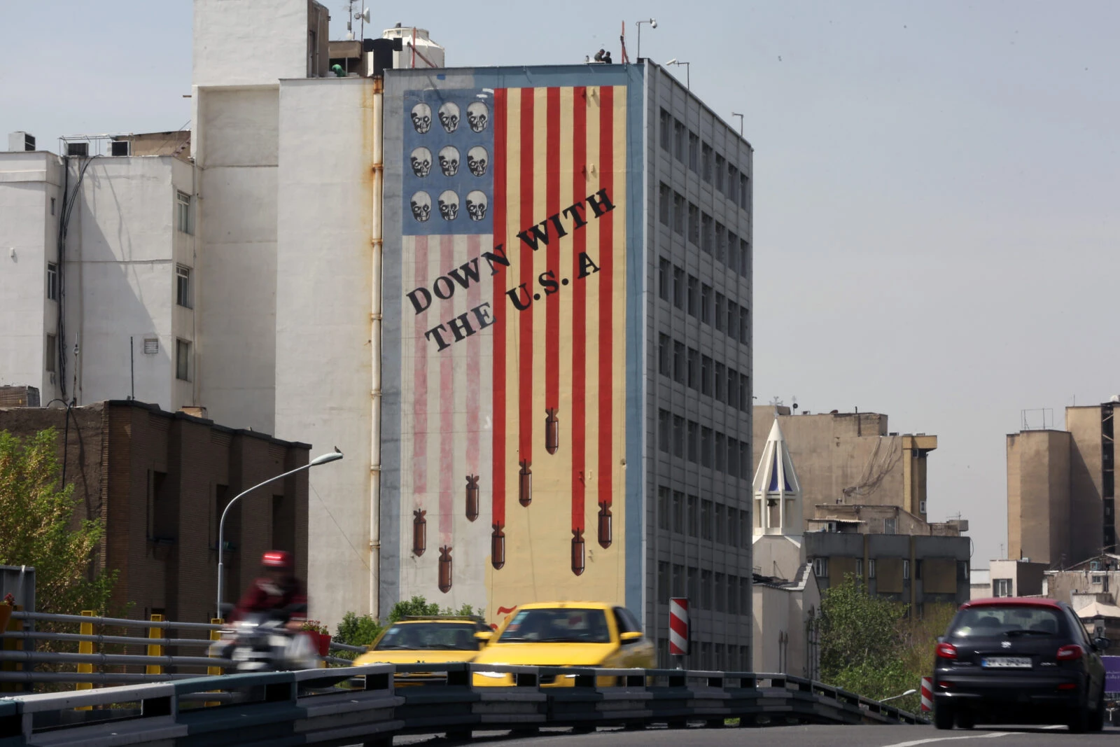 Trump urges immediate halt to Iranian oil purchases, warns of sanctions 3 Photo shows a general view of a giant anti-U.S. mural.