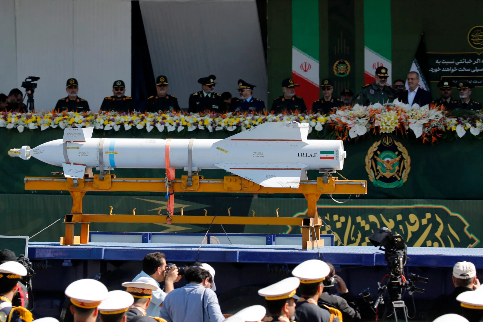 US-Iran nuclear talks scheduled for May 3 postponed, confirms Oman 3 Photo shows Iranian President Masoud Pezeshkian (3rd R) and senior civilian and military officials attending a parade of Iranian land, naval, air and special forces soldiers.