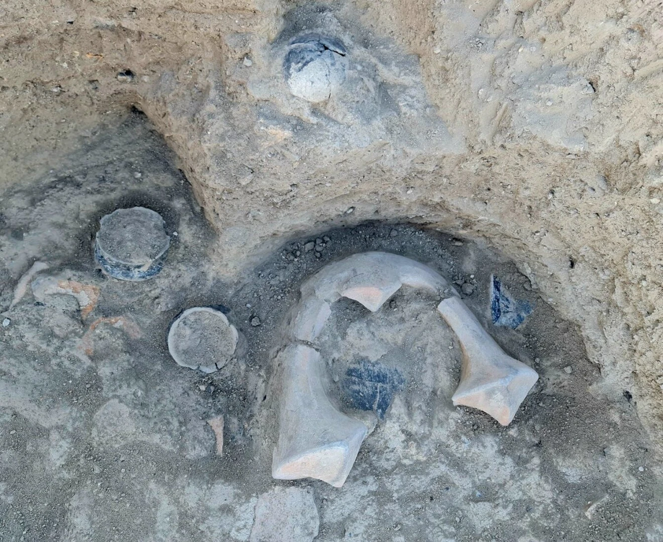 Excavation site at Elazig Tadim Castle and Mound revealing sacred hearths and terracotta vessels.
