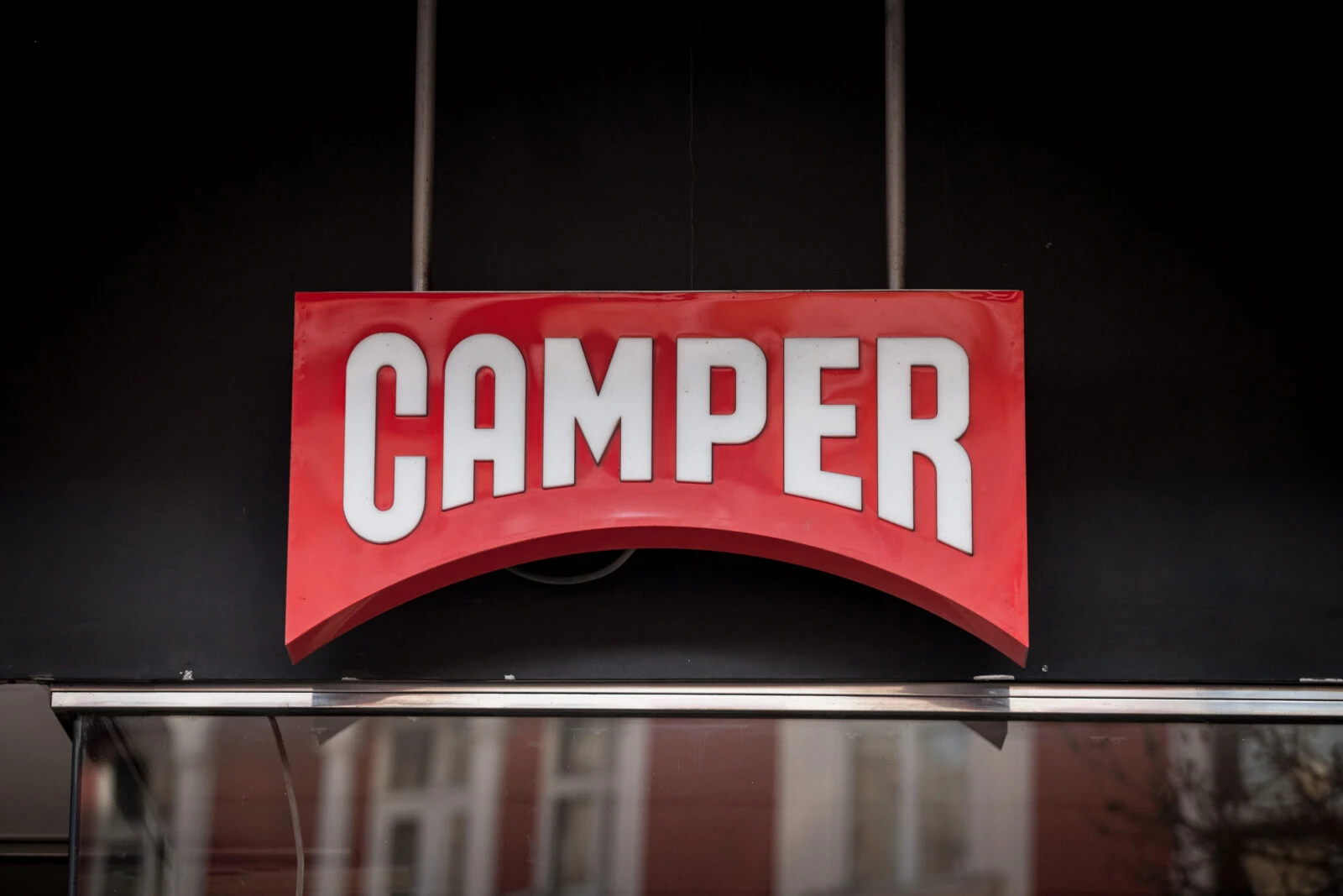 Camper store sign displayed on storefront